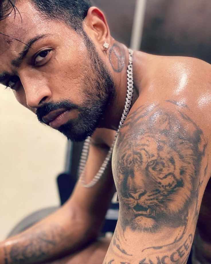 Hardik Pandya Tiger Tattoo (Left Arm)